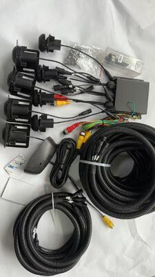 Sistem Radar Kendaraan Komersial untuk Parkir Aman dan Bantuan Pandangan Belakang di Lalu Lintas Padat